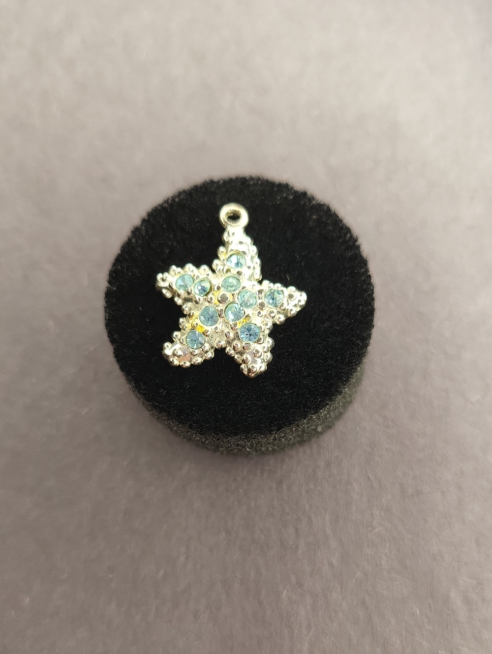 Sterling Silver Star Pendant with Light Blue Crystals